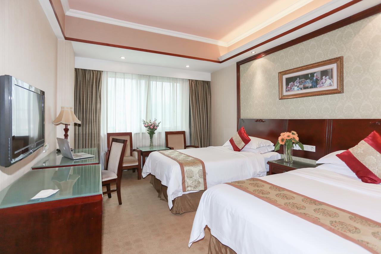 Vienna International Hotel Ningbo City Xixin Tiandi Экстерьер фото